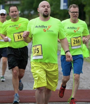 At last week's inaugural Achilles Nashville Hope & Possibility 5 Miler, John (right) helped "Team Joe Shaw" bring home First Place, Visually Impaired Male.